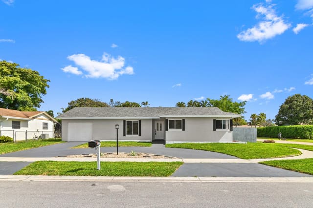 6575 Whispering Wind Way, sold in Country Lane Estates, Delray Beach, FL