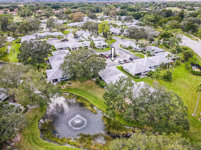 911 Club Drive, sold in Club Cottages, Palm Beach Gardens, FL