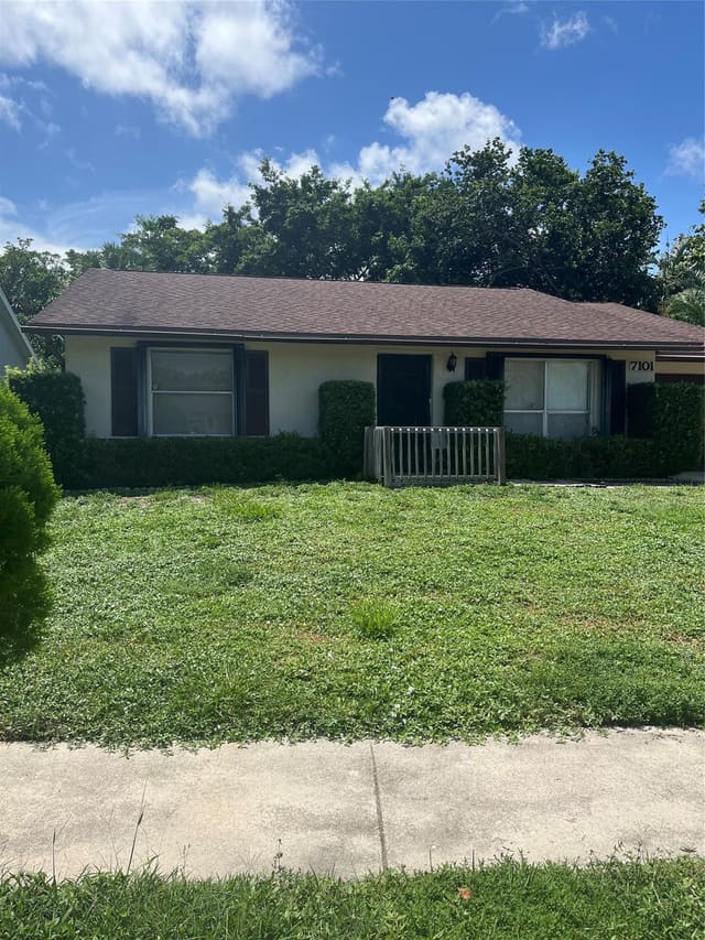 7101 Glenwood Drive, sold in Homes at Lawrence, Boynton Beach, FL