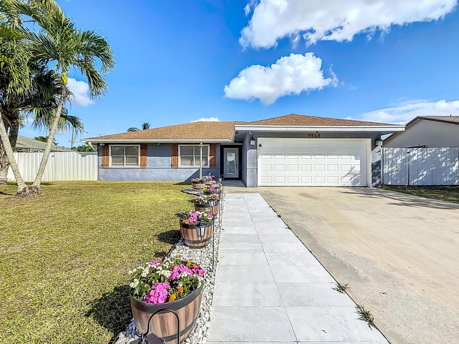 7565 Woodland Creek Lane, Lake Worth, FL 33467