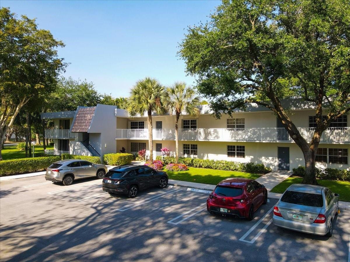 4261 W Palm Aire Drive 107 — photo 2