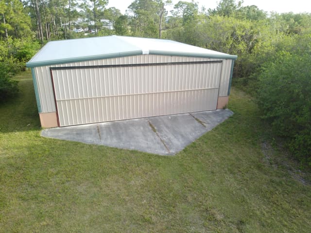 12350 Crusader Place, sold in Treasure Coast Airpark, Port St Lucie, FL