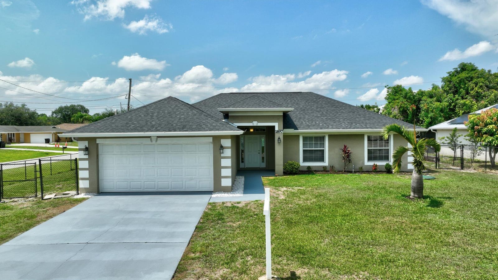 1897 SW Lofgren Avenue, Port St. Lucie, FL 34953