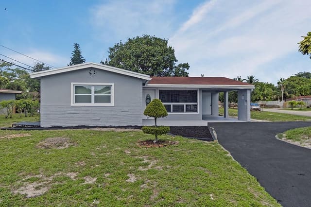 3800 NW 7th Court, sold in Academy Award Homes, Lauderhill, FL
