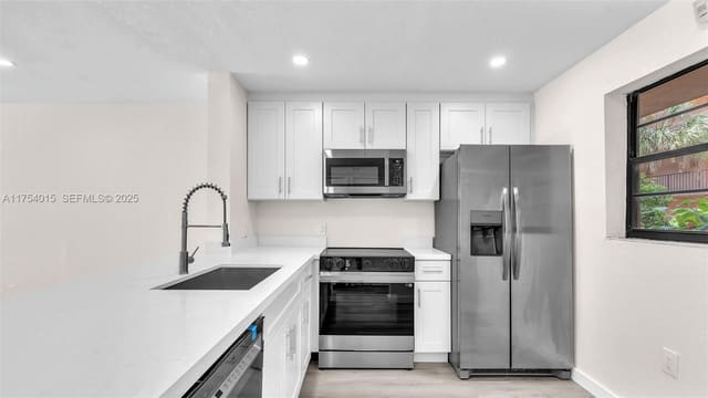 10985 SW 107th Street 103, sold in The Gardens Of Kendall Co, Miami, FL
