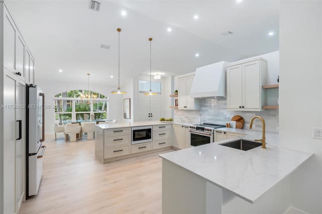640 SW 101 Avenue, sold in Pebble Creek at Jacaranda, Plantation, FL