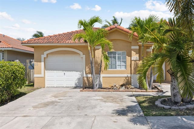 8961 SW 214th Street, sold in Precious Homes At Lakes B, Cutler Bay, FL