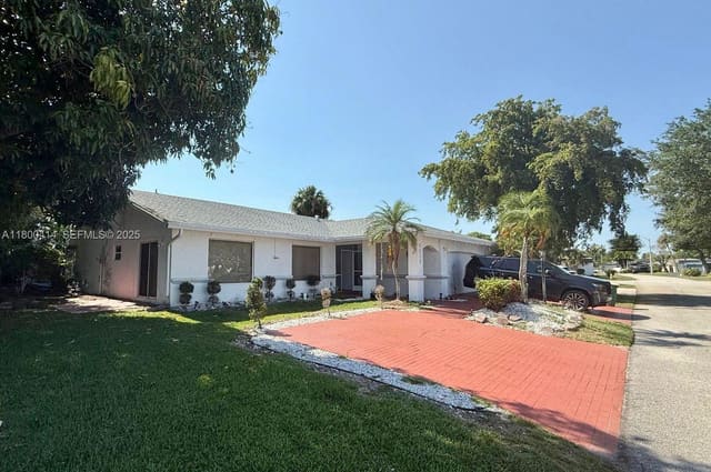 4909 Bayberry Lane, sold in Woodlands Sec One-Phase O, Tamarac, FL