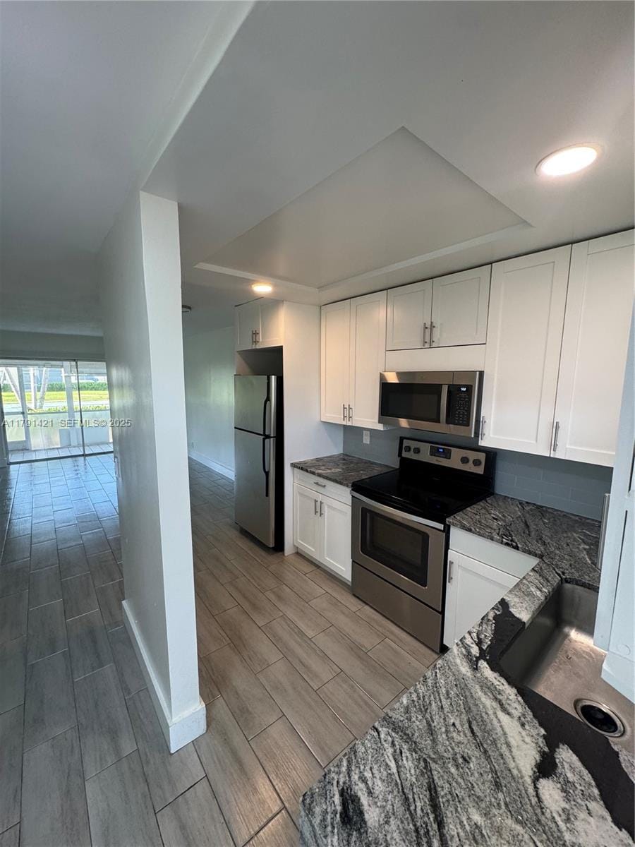 9851 Sandalfoot Boulevard 208, Boca Raton, FL 33428