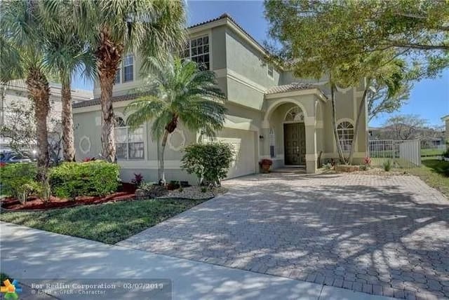 5874 NW 49th Lane, sold in Sawgrass Exchange, Coconut Creek, FL