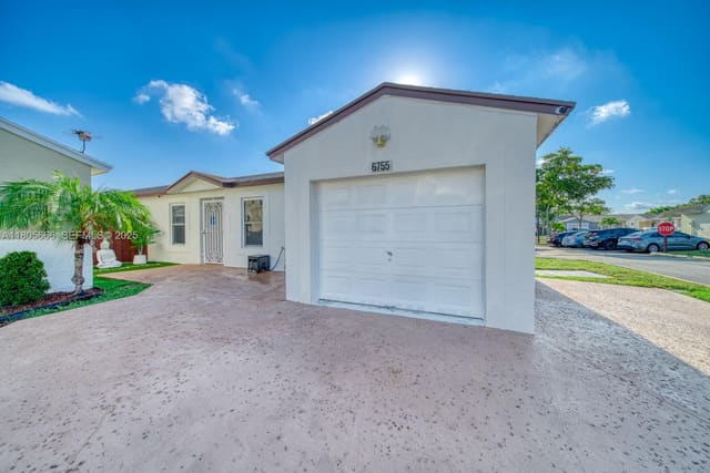 6755 NW 199th Street, sold in Country Lake Homes 2nd Ad, Hialeah, FL
