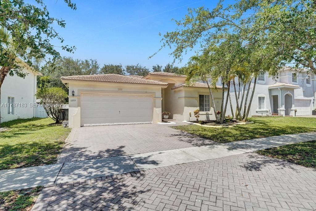 4 bedroom home for sale at 12711 45th, Miramar, FL 33027 — $695,000