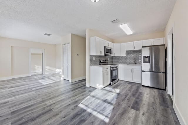 1041 NW 25th Way, sold in Dillard Park Estates 1st, Fort Lauderdale, FL
