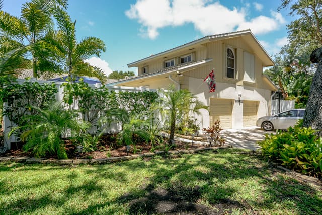 12557 Woodmill Drive, sold in Westwood Lakes, Palm Beach Gardens, FL