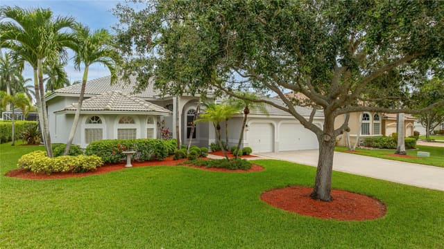 4940 Kensington Circle, sold in Kensington Glen, Coral Springs, FL