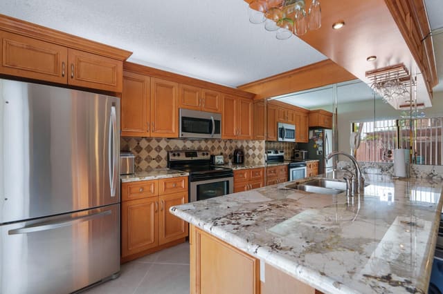 6021 NW 54th Lane, sold in Woodland Lake Estates, Tamarac, FL