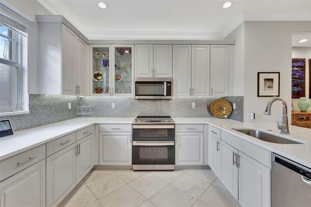 1033 NE 17th Way 704, sold in Villa Medici Condo, Fort Lauderdale, FL
