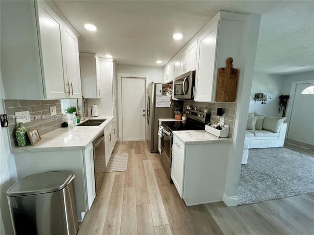 6868 NW 28th Street, sold in Gold Key Villas, Sunrise, FL