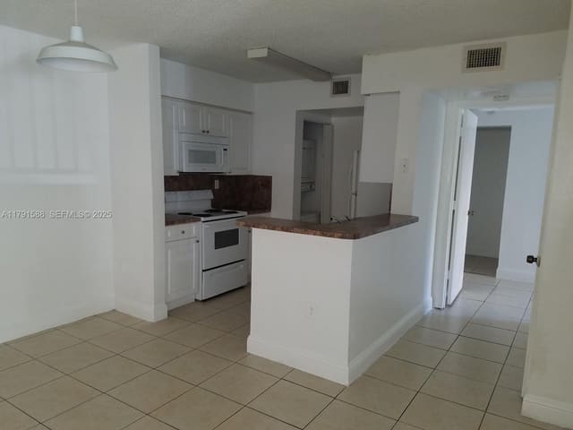 15231 SW 80th Street 209, sold in Kendall Lake Towers Condo, Miami, FL