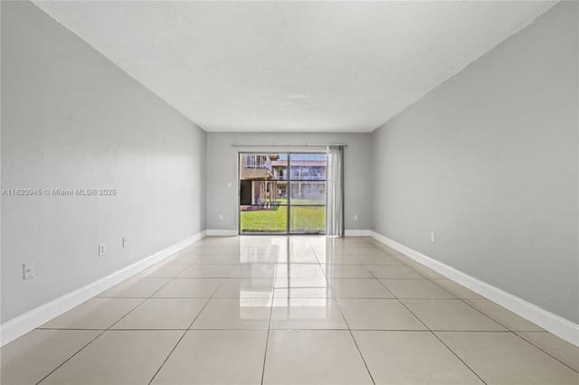 301 NW 177th Street 104, sold in New World Condo Apts Iv, Miami Gardens, FL