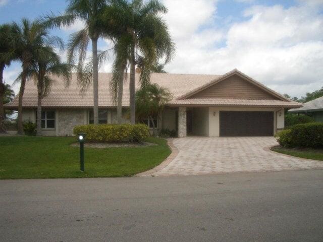 24 Dunbar Road, sold in Marlwood Estates, Palm Beach Gardens, FL