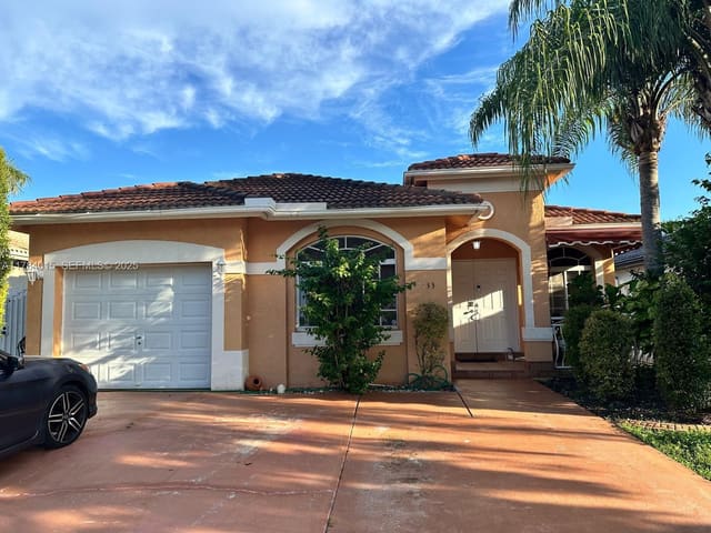 7733 NW 200th Street, sold in North Palm Estates Homes, Hialeah, FL