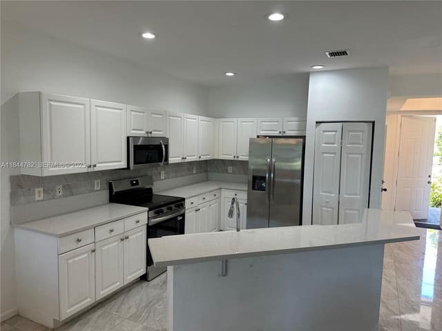 1990 Marsh Harbor Drive, Riviera Beach, FL 33404
