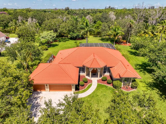 5681 Lago Del Sol Drive, sold in Loxahatchee Lakes, Lake Worth, FL