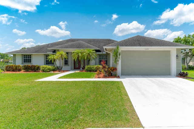 1063 SW Sand Oak Drive, sold in Hunters Creek, Palm City, FL