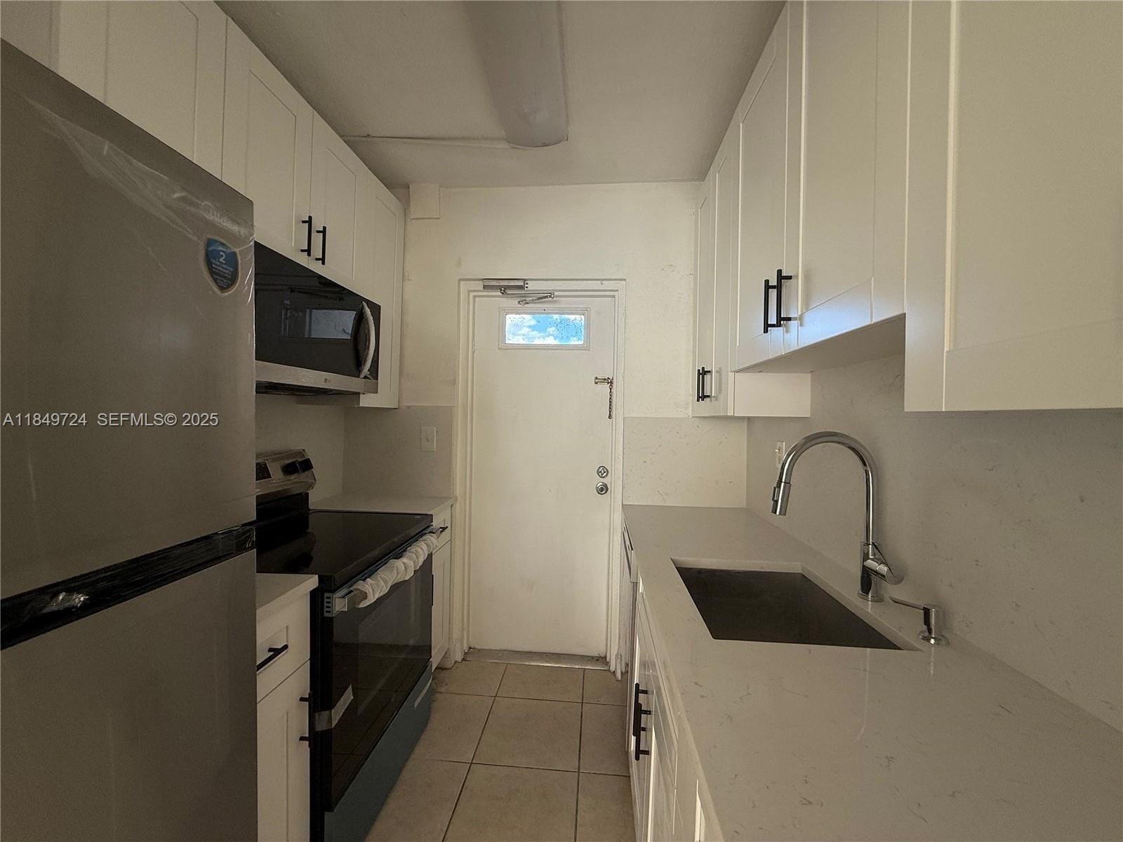 10900 SW 104th Street 323 — photo 3