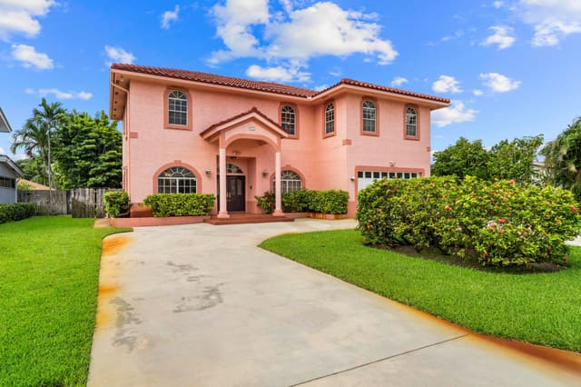 1820 Carambola Road, sold in Fla Mango Grovelets, Lake Clarke Shores, FL