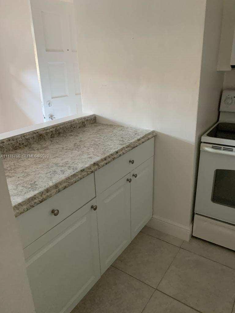 5900 NW 17th Place 109 — photo 7
