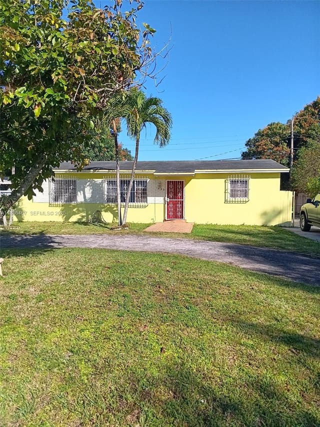 1825 NW 112th Street, sold in Queens Park, Miami, FL