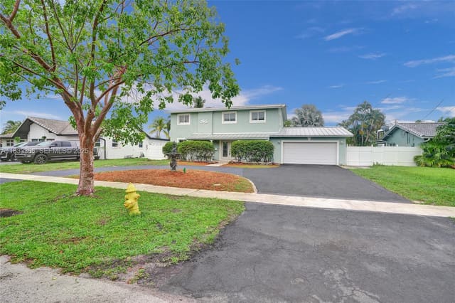5840 SW 19th Street, sold in Cove Homesites, Plantation, FL