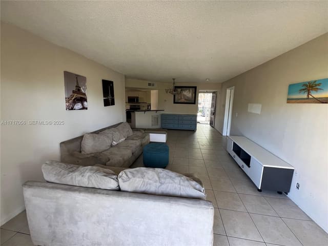 8871 Wiles Road 208, Coral Springs, FL 33067
