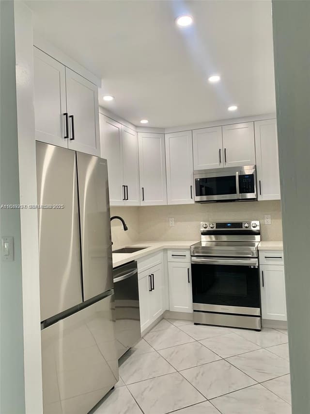 4855 NW 7th Street 208-6, sold in Sunset Villas Phase II CO, Miami, FL