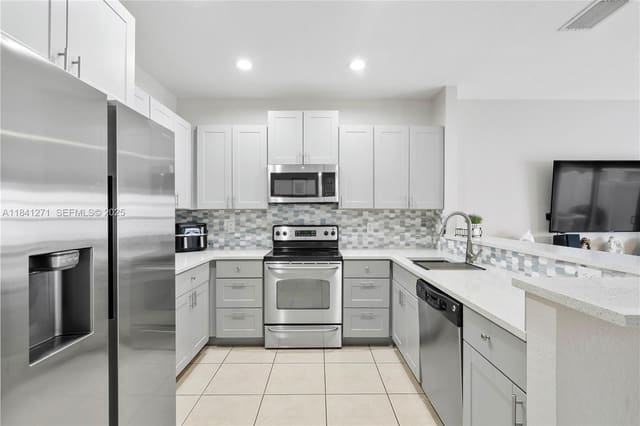 2979 NW 30th Place, sold in Cambridge Park, Oakland Park, FL