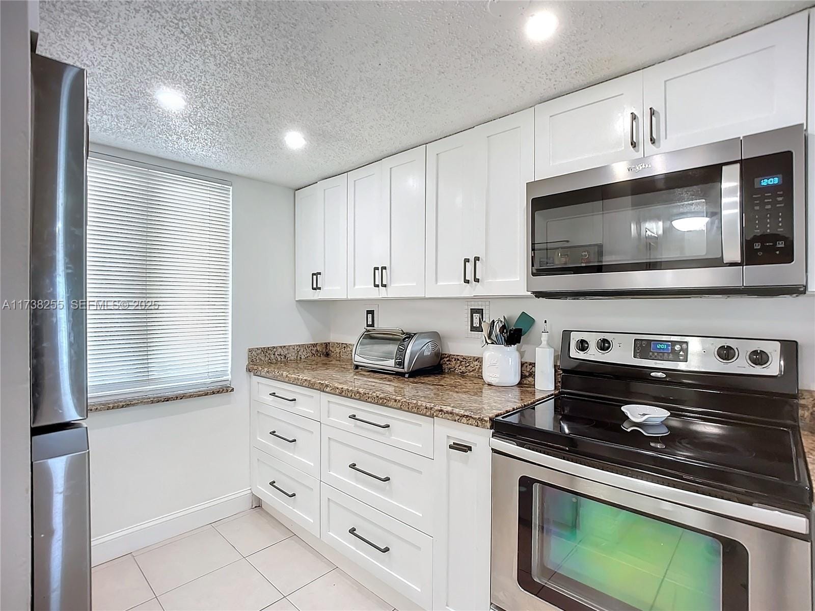 9915 W Okeechobee Road 2-308 — photo 3