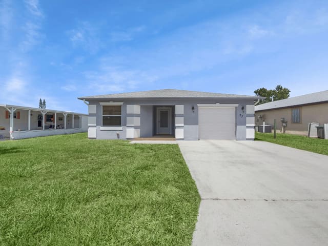 73 Golf Drive, sold in Spanish Lakes One Leasehold Estates, Port St Lucie, FL