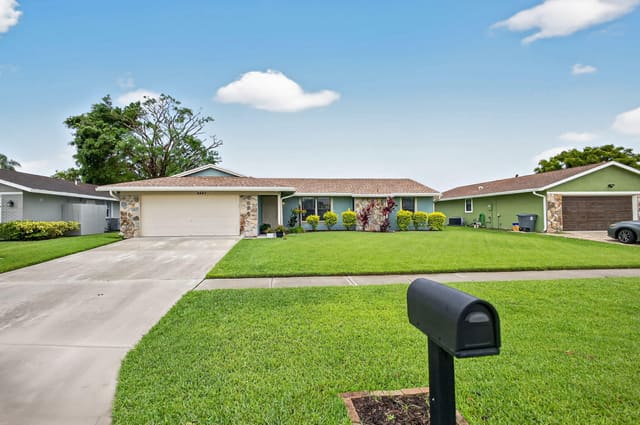 8443 Raymond Drive, sold in Le Chalet Iv-B, Boynton Beach, FL