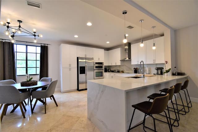 4866 NW 16th Avenue, sold in Centra Blue Lake Townhomes, Boca Raton, FL