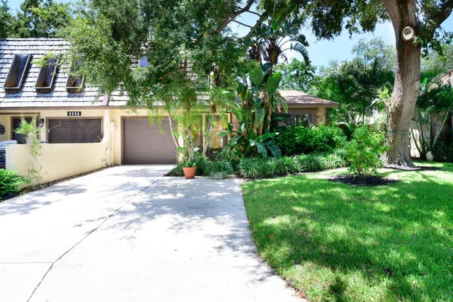 1085 Raintree Drive, sold in Rainwood East Replat, Palm Beach Gardens, FL
