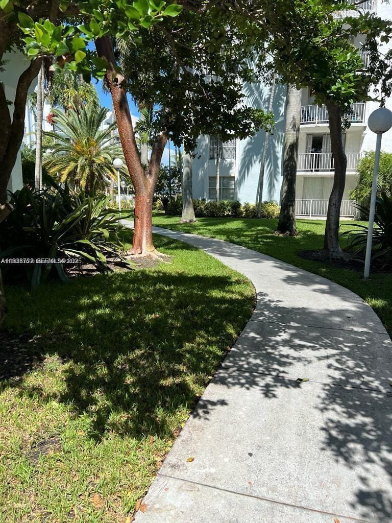 498 NW 165th St Road D-407 — photo 11
