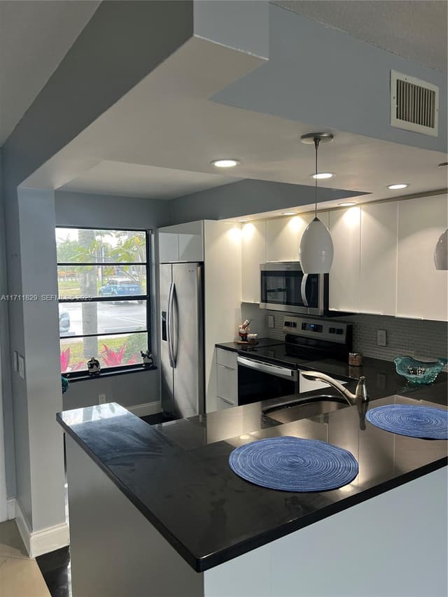 202 Lake Pointe Drive 107, Oakland Park, FL 33309