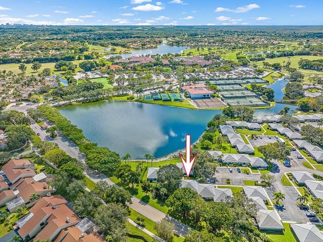 114 Club Drive, sold in Club Cottages, Palm Beach Gardens, FL