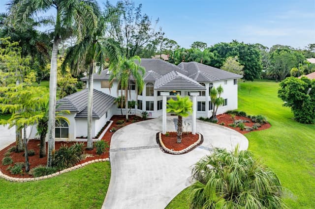 6922 NW 63rd Way, sold in Pine Tree Estates, Parkland, FL