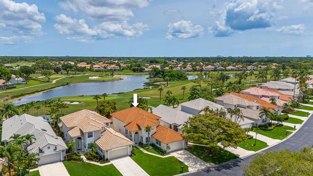 327 Eagleton Golf Drive, sold in Eagleton Lakes, Palm Beach Gardens, FL