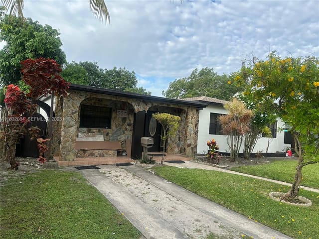 560 NE 158th Street, sold in Breezeswept Heights 1st A, Miami, FL