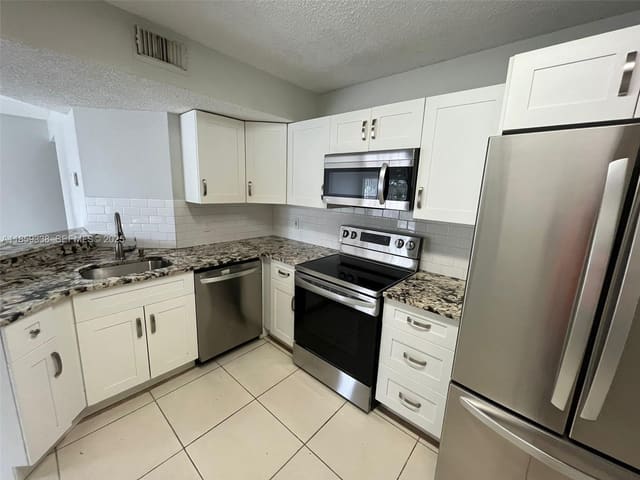 8821 Wiles Road 203, sold in Edgewater Condo, Coral Springs, FL