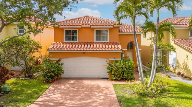 1430 N Trafalgar Circle, sold in The Homes at East Lake, Hollywood, FL